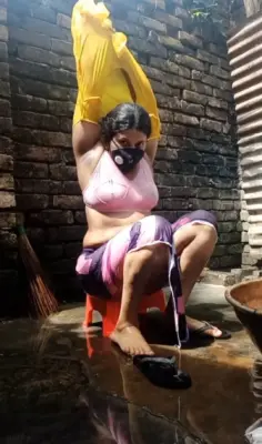 Masked Bengali Hot Bhabhi Nude Bathing And Peeing Photo